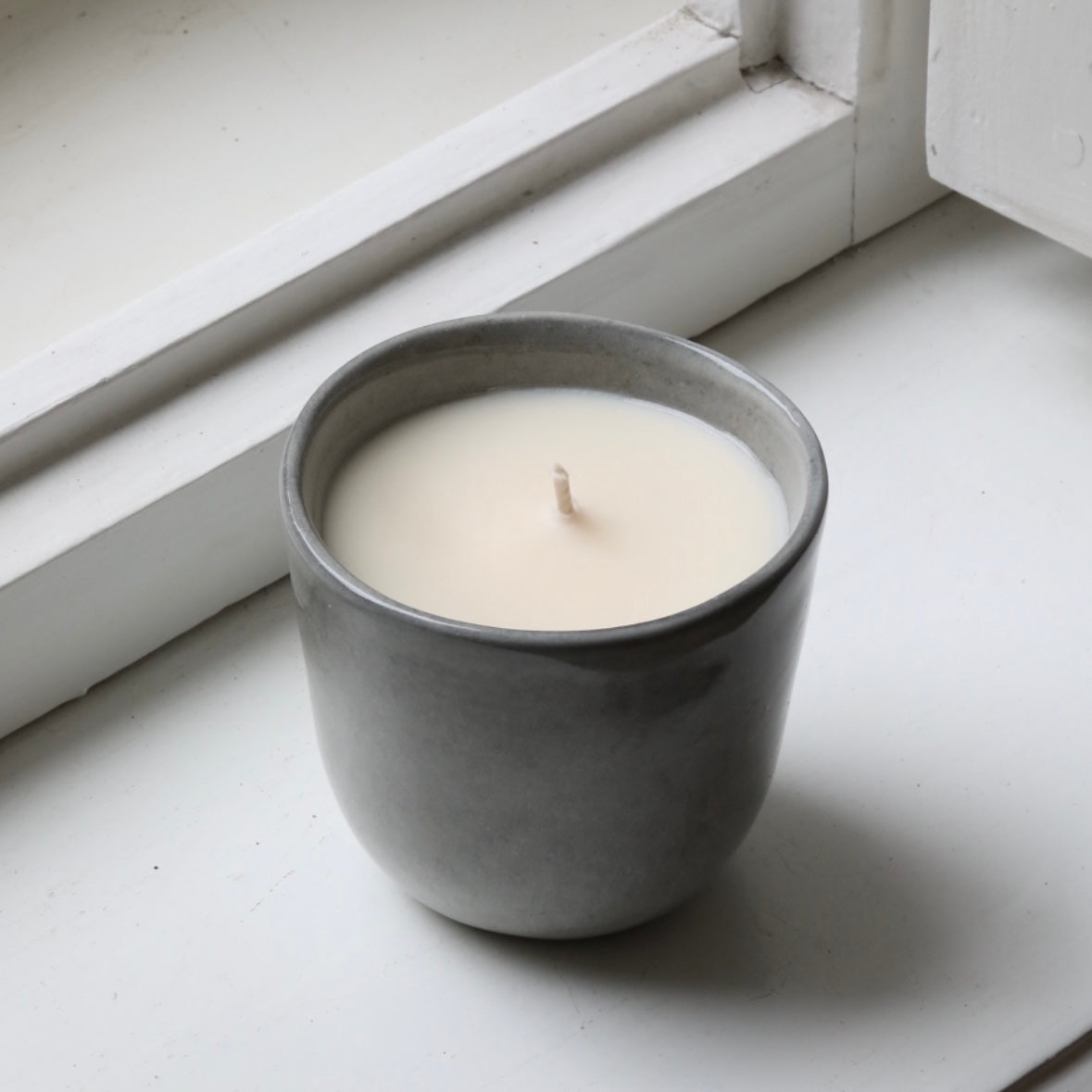 Bougie parfumée dans une coupe Cappuccino