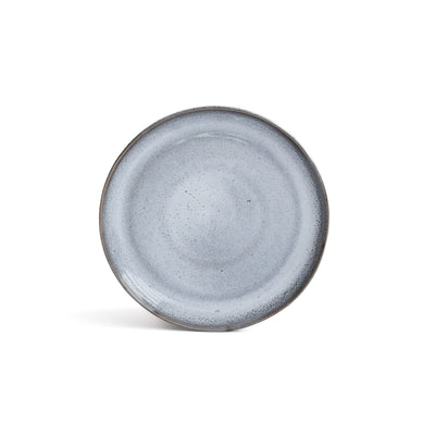 Petite assiette à hors-d'œuvre bleue légèrement chinée avec bord bleu foncé