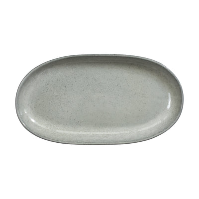 Soucoupe gris clair sur fond blanc dégagé