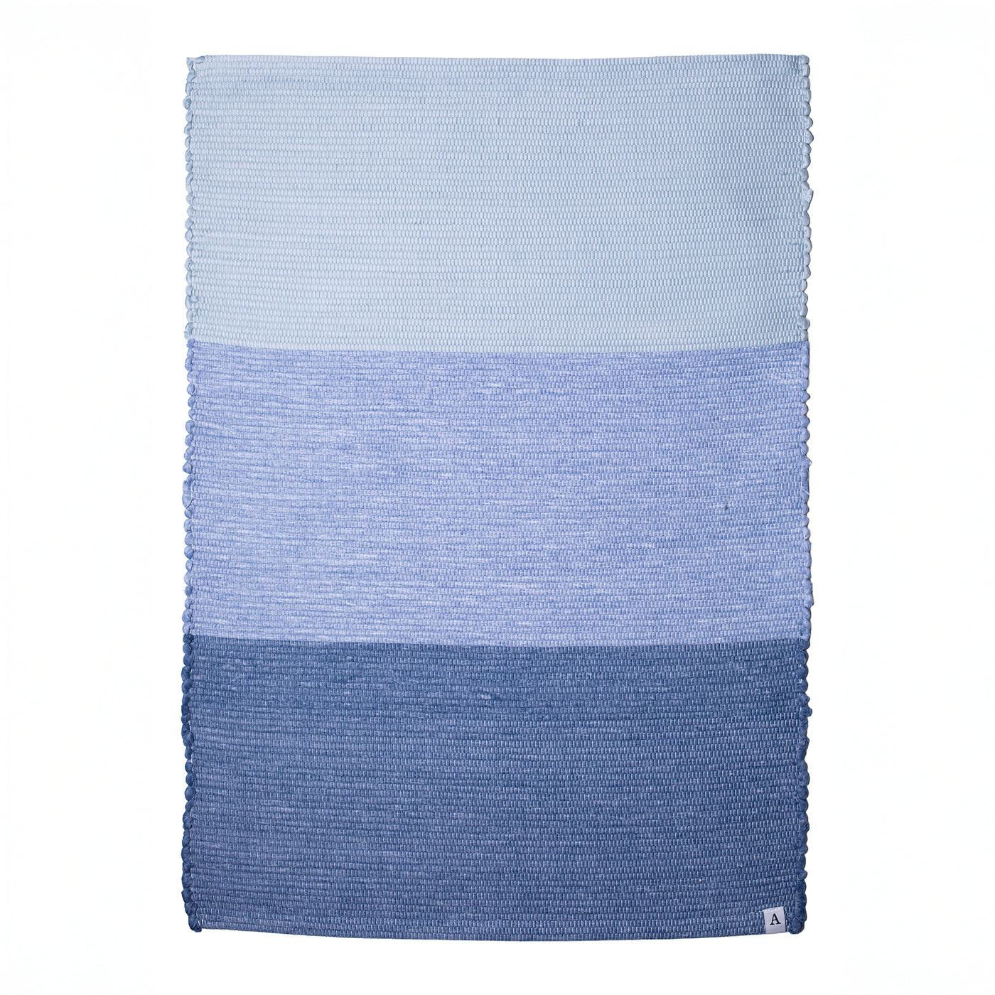 Tapis de bain tissé à la main en 3 tons de bleu sur fond blanc