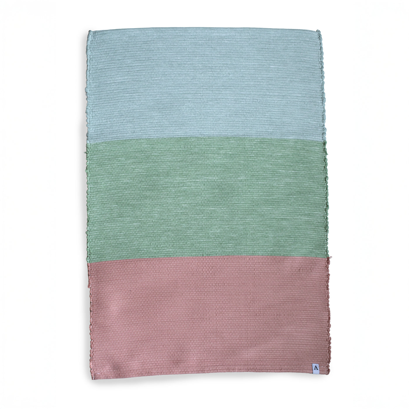 Détourage d'un tapis bleu vert rose color block détouré sur fond blanc