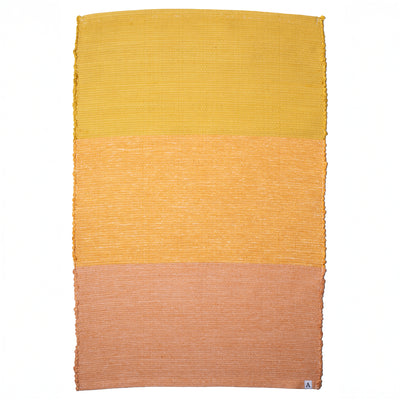 Tapis de salle de bain en coton recyclé dans trois tons de jaune et d'orange
