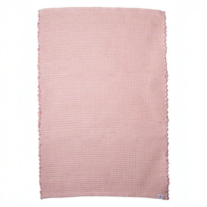 Petit tapis rayé de jute vieux rose en restes de laine tissé à la main au Portugal devant blanc libre